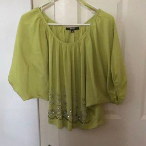 Beautifu blouse -elegant detail on the bottom. Perfect casual w jeans or dressy.